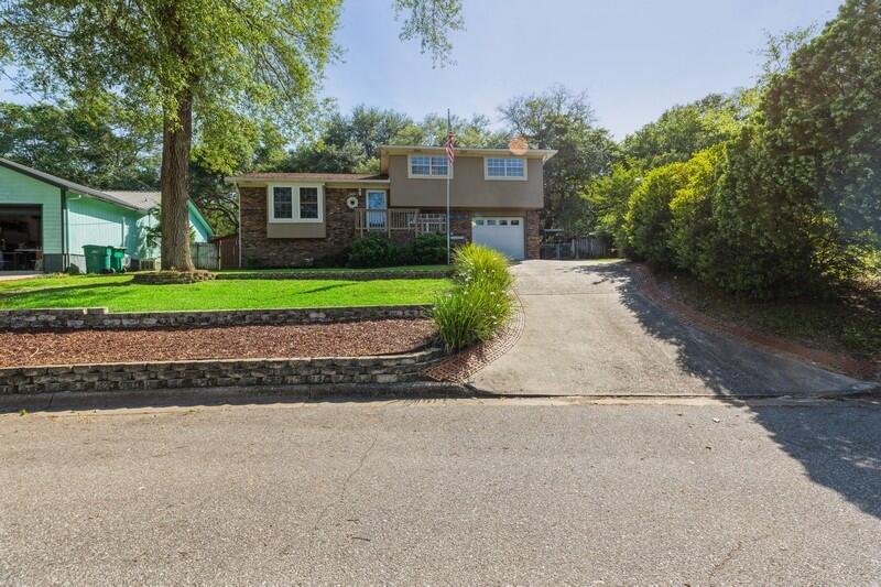 582 Woodlow Road Niceville, FL 32578 - Photo 1 of 30 a house view with a garden space