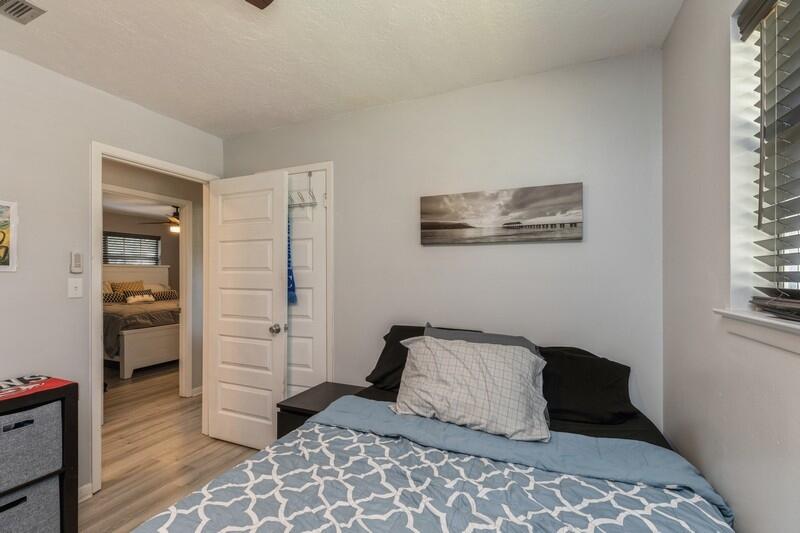 582 Woodlow Road Niceville, FL 32578 - Photo 21 of 30 a bedroom with a bed and window