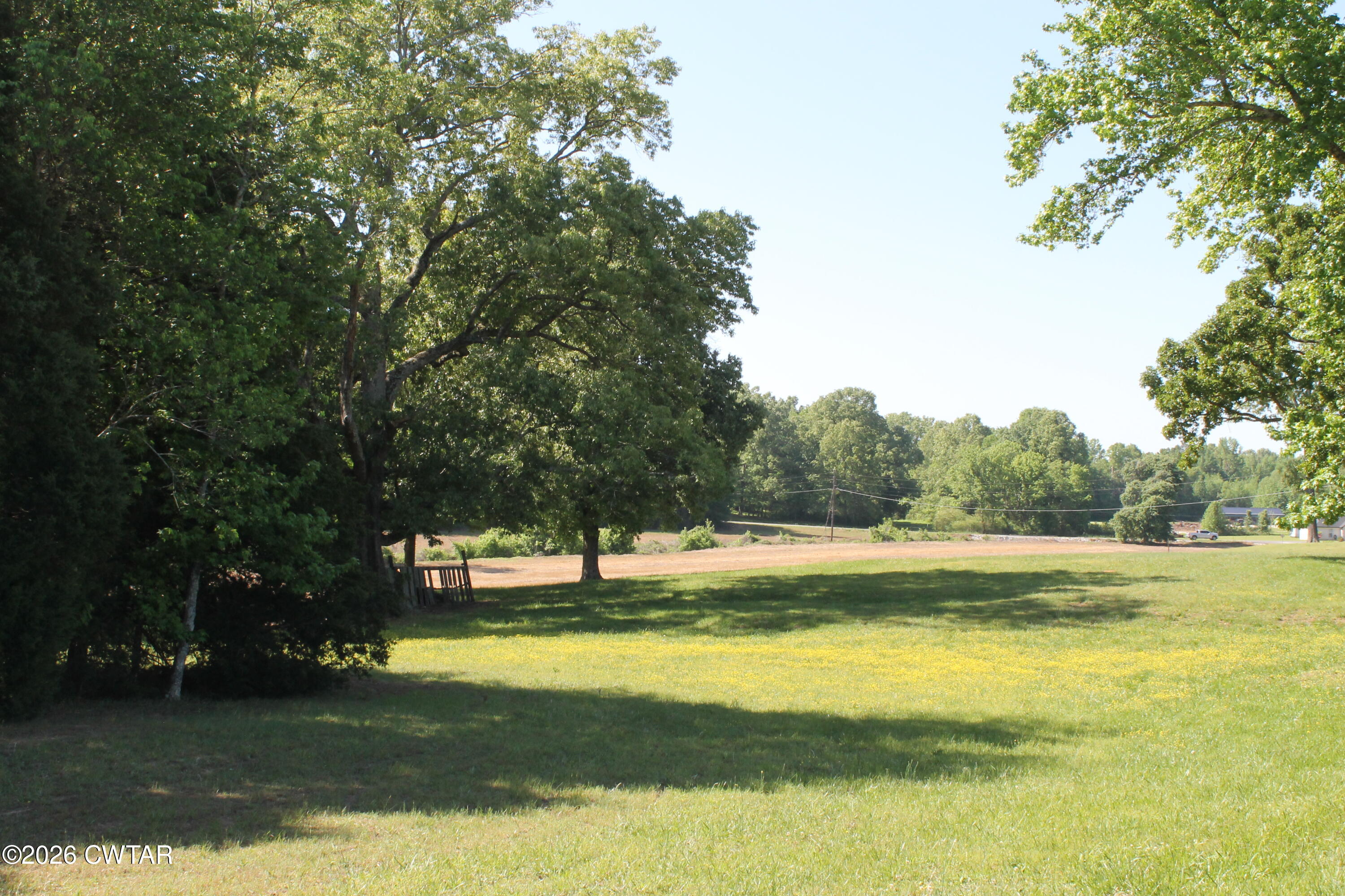 0 Williams Road Henderson, TN 38340 - Photo 24 of 29 a view of a swimming pool with an outdoor space and seating area