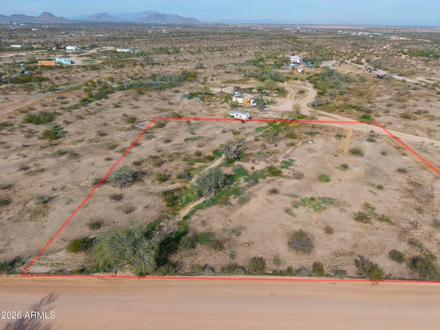 an aerial view of mountain with beach