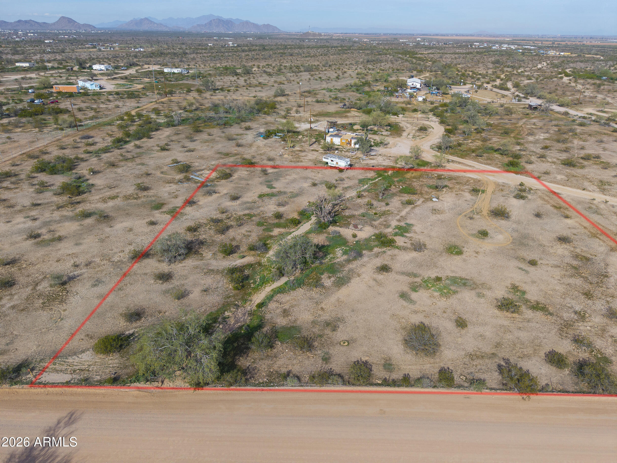 3290 North Ralston Road, Unit 49 Maricopa, AZ 85139 - Photo 3 of 12 an aerial view of mountain with beach