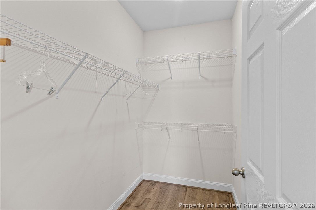 288 Gallery Drive, Unit 301 Spring Lake, NC 28390 - Photo 15 of 36 a view of a room with racks on the wall