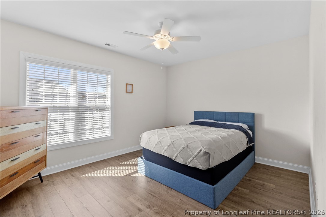 288 Gallery Drive, Unit 301 Spring Lake, NC 28390 - Photo 24 of 36 a bedroom with a bed and window