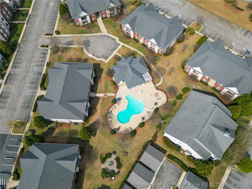 288 Gallery Drive, Unit 301 Spring Lake, NC 28390 - Photo 33 of 36 an aerial view of a house with a yard and swimming pool