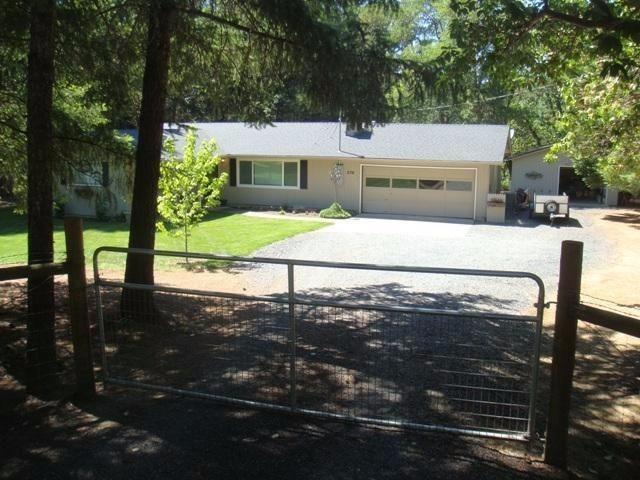 576 Upper Applegate Road Jacksonville, OR 97530 - Photo 10 of 10 a view of a house with backyard and porch