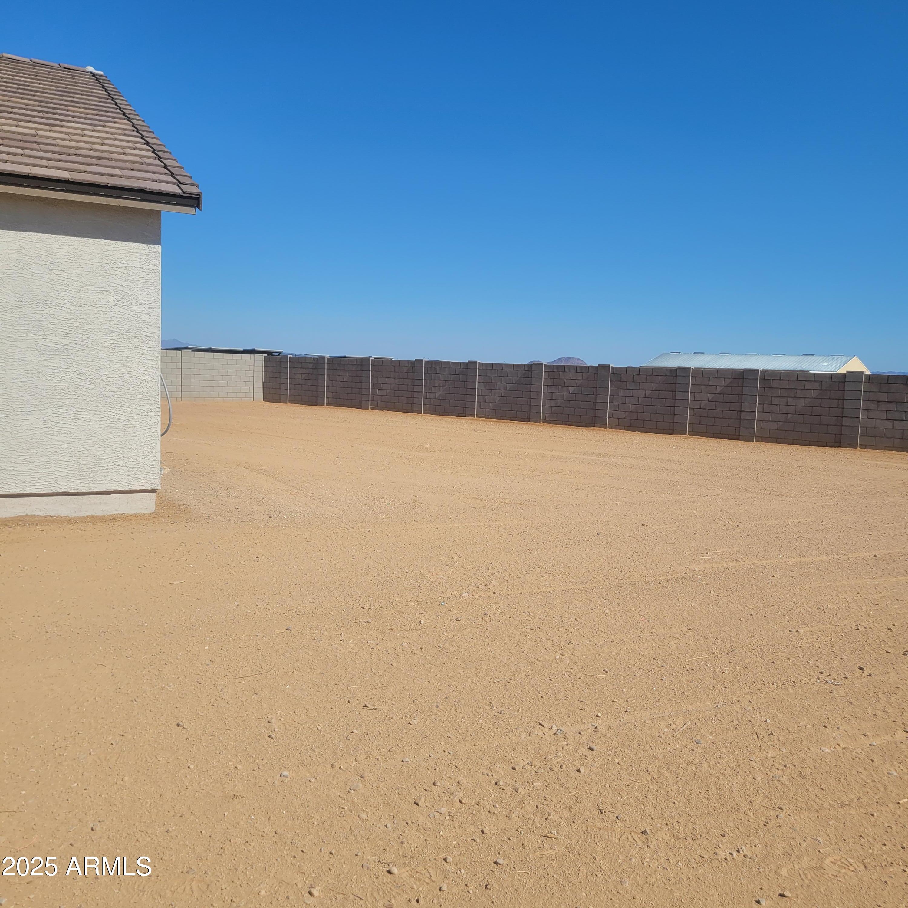 25489 West Fraktur Road Buckeye, AZ 85326 - Photo 3 of 36 LOT 276 SIDE YARD