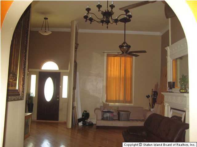 53 Belair Road Staten Island, NY 10305 - Photo 2 of 14 a bathroom with a sink and a mirror