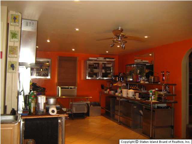 53 Belair Road Staten Island, NY 10305 - Photo 5 of 14 a view of a room with gym equipment