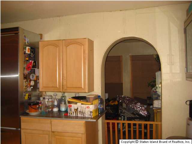 53 Belair Road Staten Island, NY 10305 - Photo 8 of 14 a bathroom with a sink and mirror