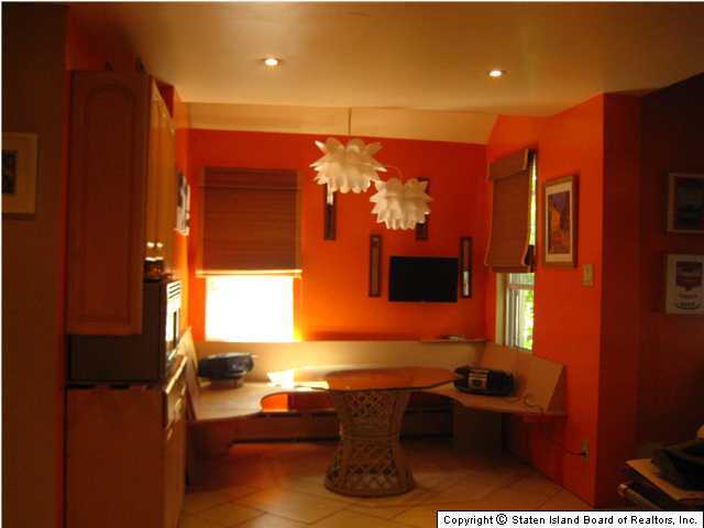 53 Belair Road Staten Island, NY 10305 - Photo 9 of 14 a room with furniture window and screen