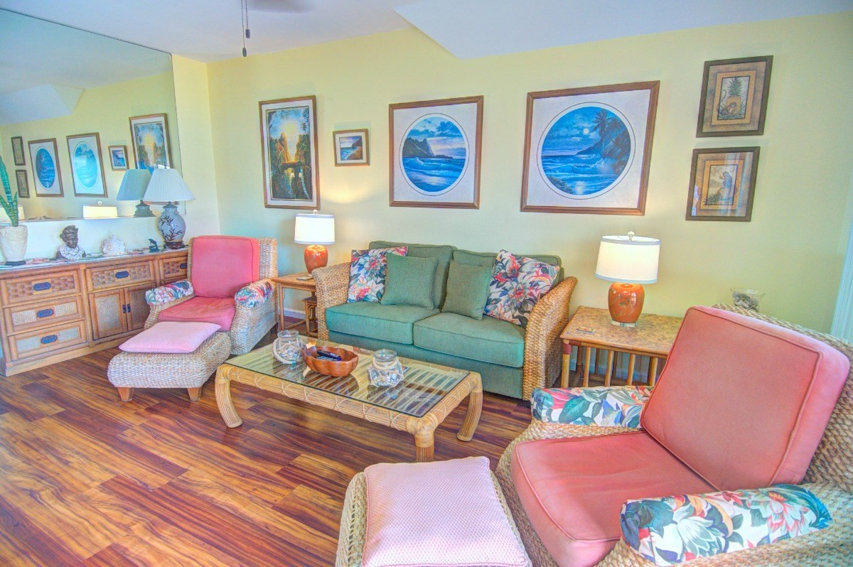410 Papaloa Road, Unit 233 Kapaa, HI 96746 - Photo 10 of 13 a living room with furniture and a wooden floor