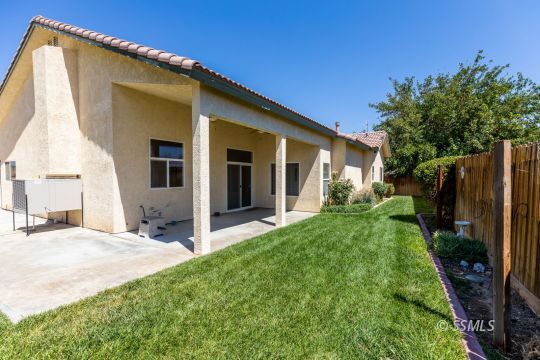 624 Pinon Court Ridgecrest, CA 93555 - Photo 41 of 46 a view of a house with backyard and sitting area