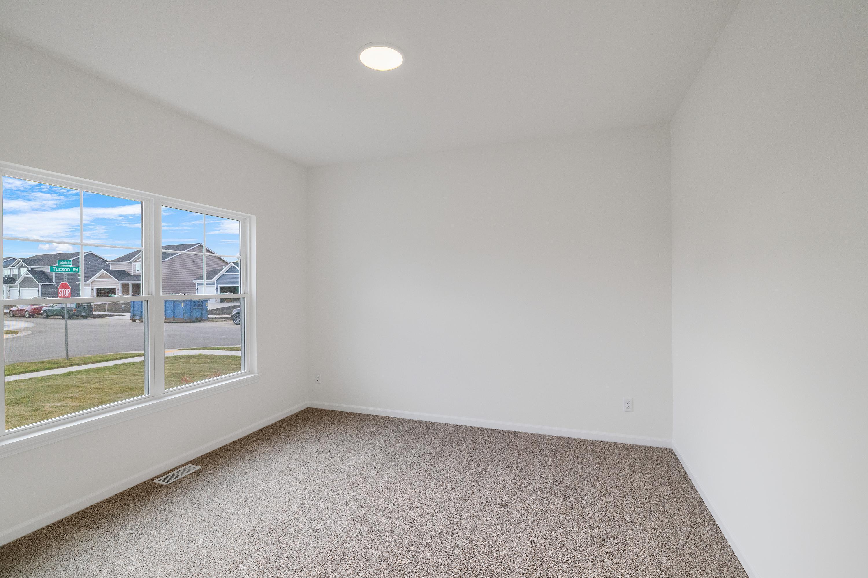 6852 Tucson Road Schererville, IN 46375 - Photo 7 of 28 a view of an empty room with a window