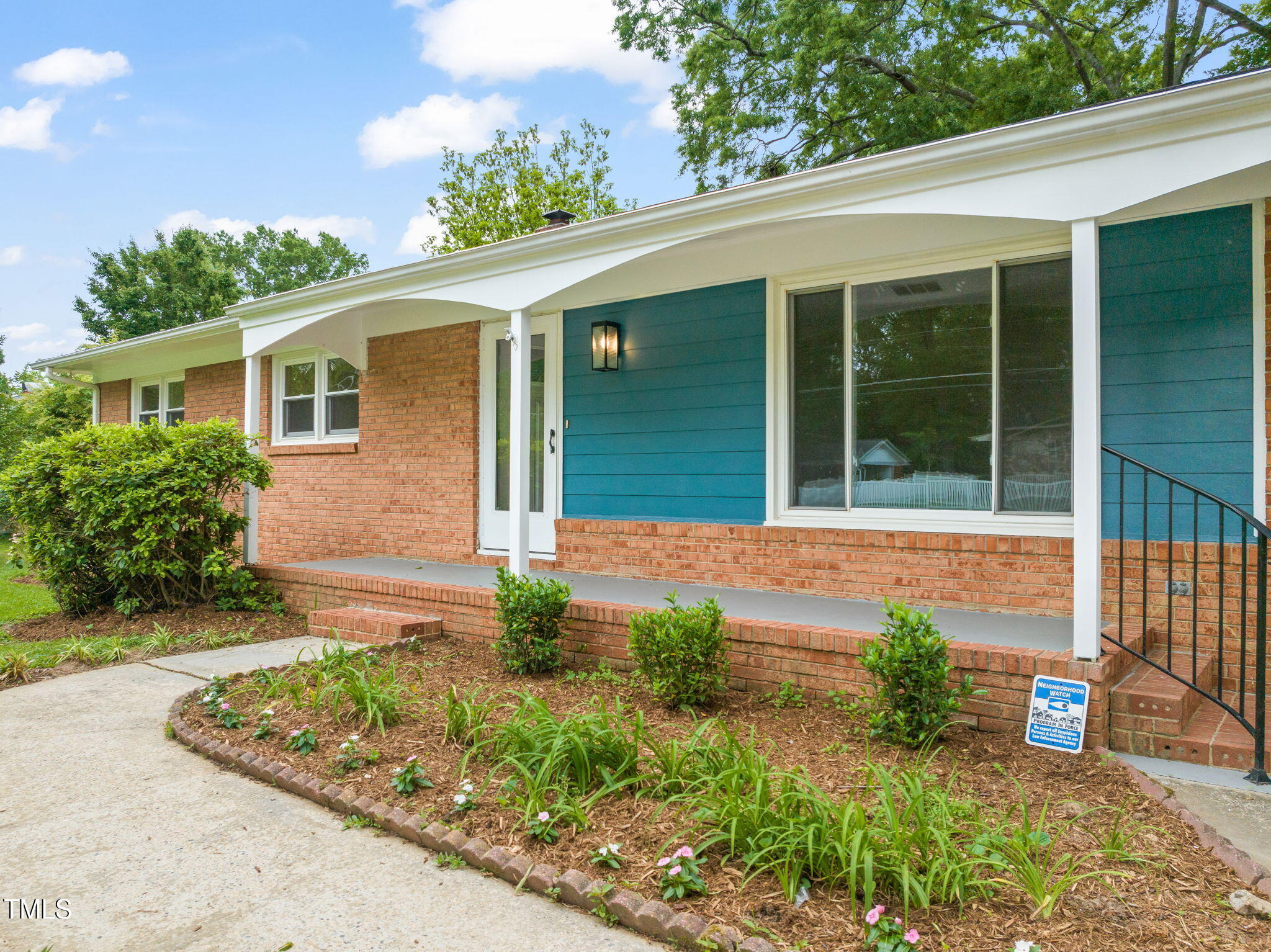 413 Winterlochen Road Raleigh, NC 27603 - Photo 37 of 44 front view of a house with potted plants