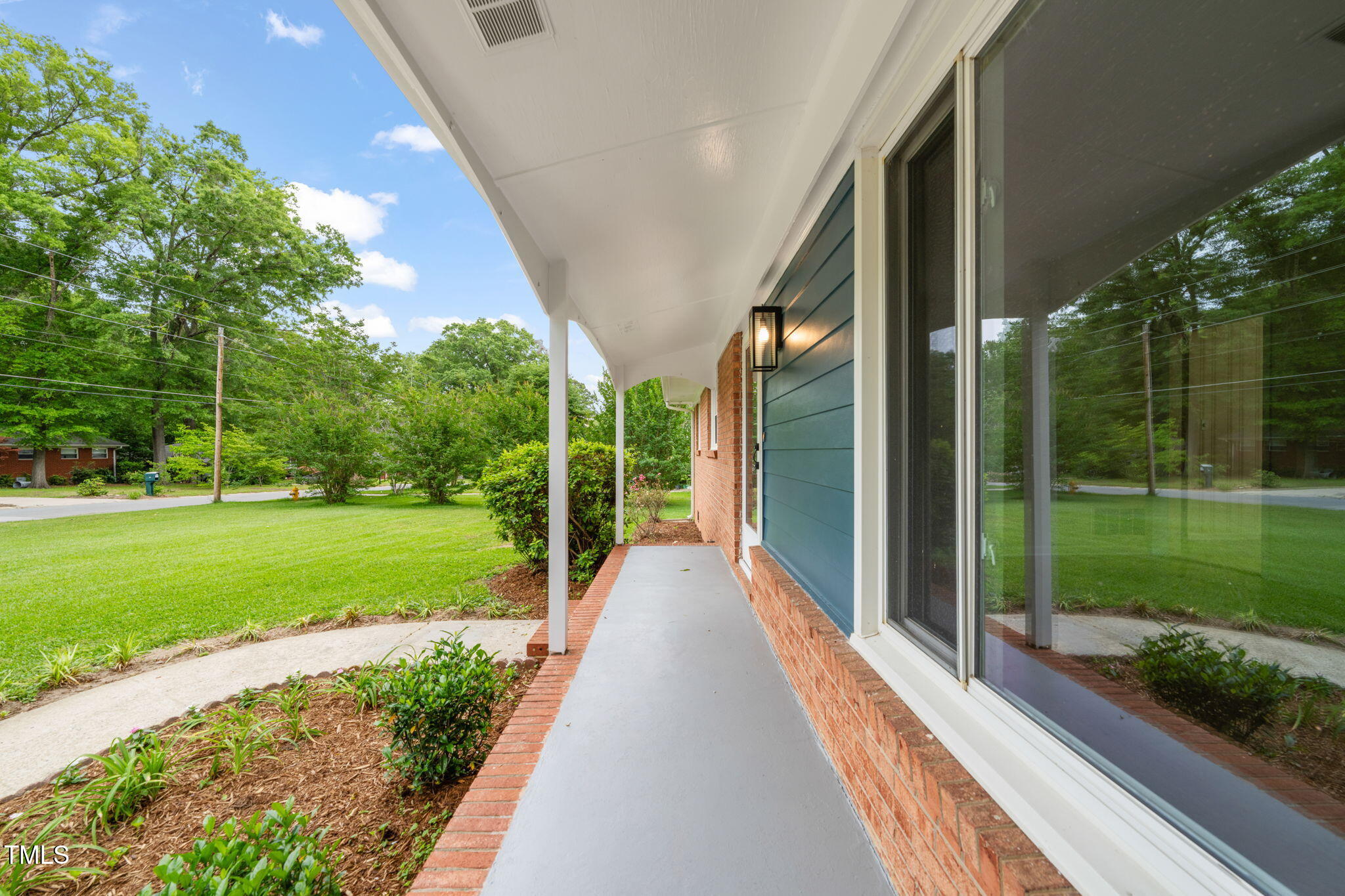 413 Winterlochen Road Raleigh, NC 27603 - Photo 40 of 44 a view of a house with backyard