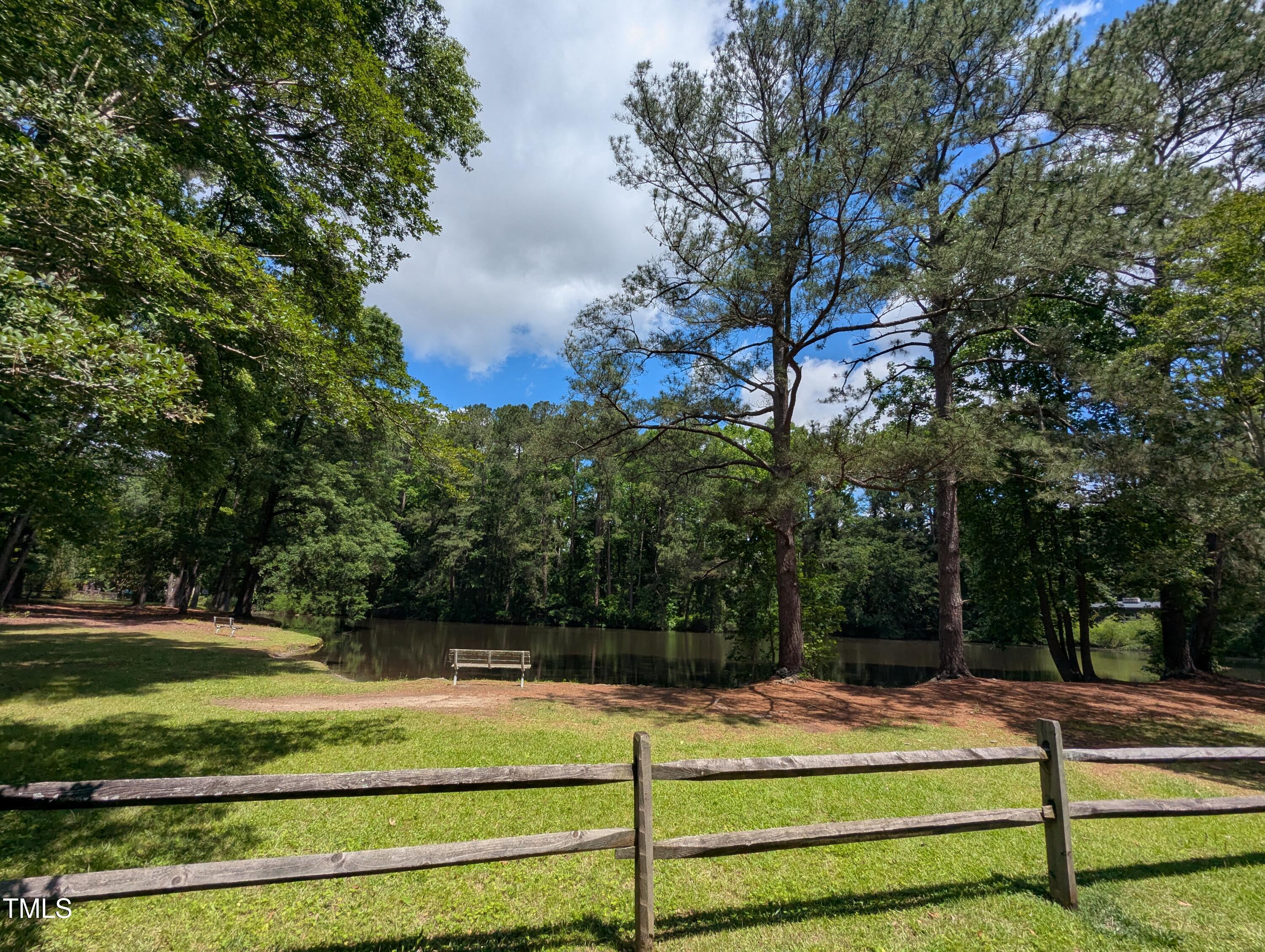 413 Winterlochen Road Raleigh, NC 27603 - Photo 42 of 44 a view of a playground with basketball court
