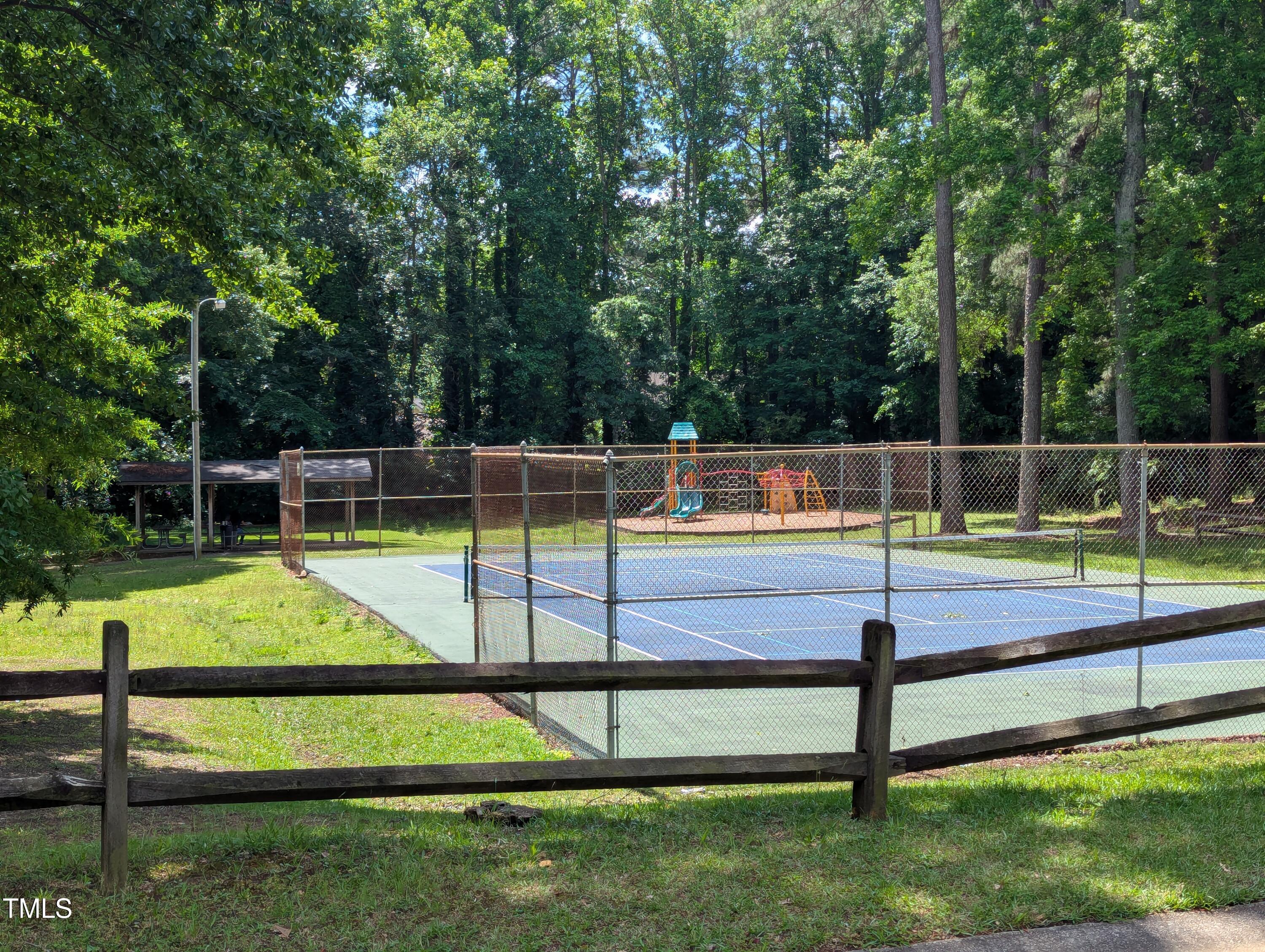 413 Winterlochen Road Raleigh, NC 27603 - Photo 43 of 44 a view of sitting area with swimming pool and sitting area