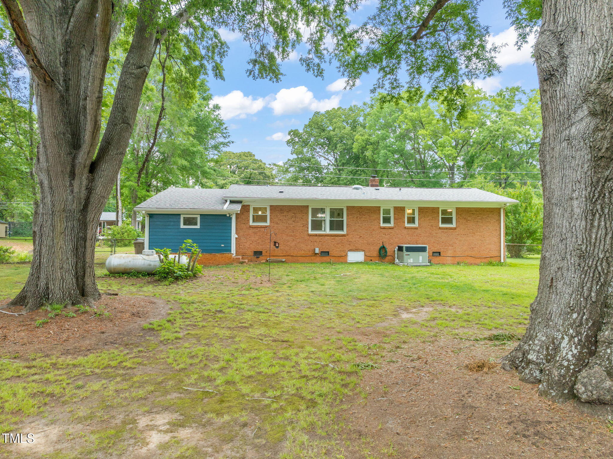 413 Winterlochen Road Raleigh, NC 27603 - Photo 6 of 44 front view of a house with a yard