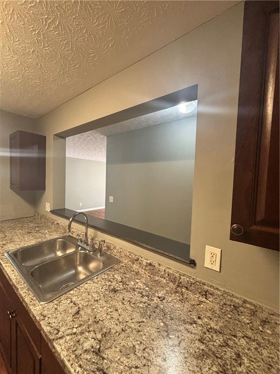 3101 Par 3 Way Lithonia, GA 30038 - Photo 16 of 32 a bathroom with a granite countertop sink and a mirror