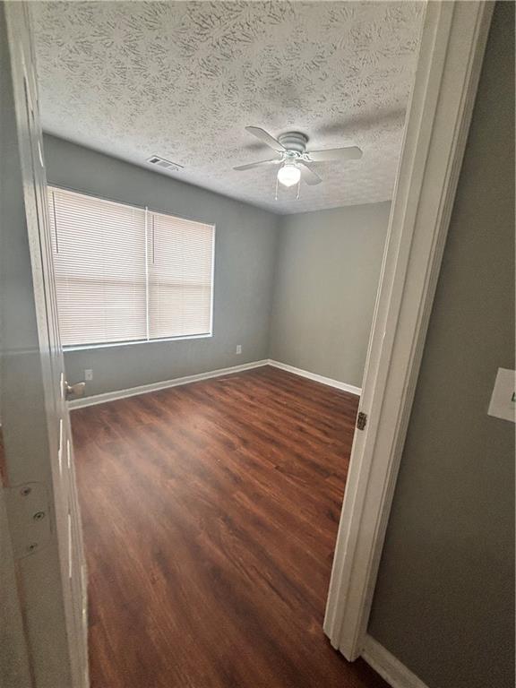 3101 Par 3 Way Lithonia, GA 30038 - Photo 20 of 32 an empty room with windows and closet