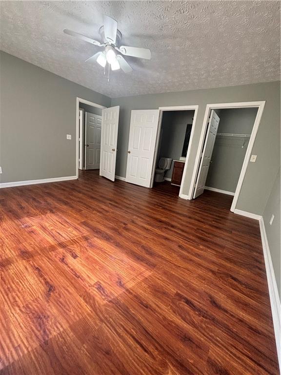 3101 Par 3 Way Lithonia, GA 30038 - Photo 24 of 32 a view of an empty room with wooden floor and a ceiling fan