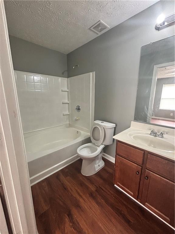 3101 Par 3 Way Lithonia, GA 30038 - Photo 25 of 32 a bathroom with a sink a toilet and bathtub