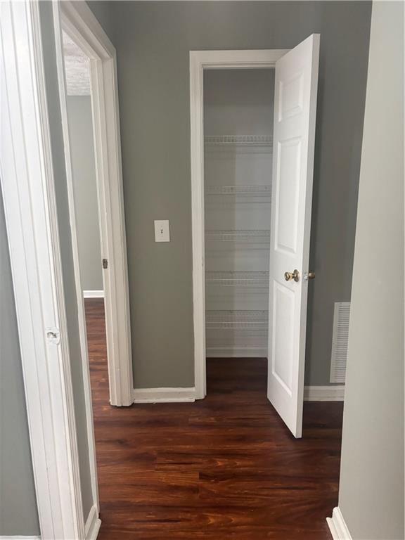 3101 Par 3 Way Lithonia, GA 30038 - Photo 27 of 32 an empty room with wooden floor and entrance