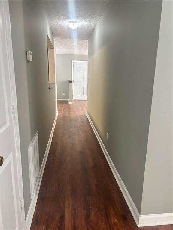 3101 Par 3 Way Lithonia, GA 30038 - Photo 28 of 32 a view of a hallway with wooden floor