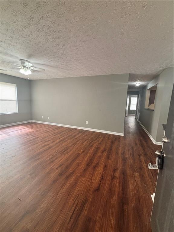 3101 Par 3 Way Lithonia, GA 30038 - Photo 3 of 32 an empty room with wooden floor and windows