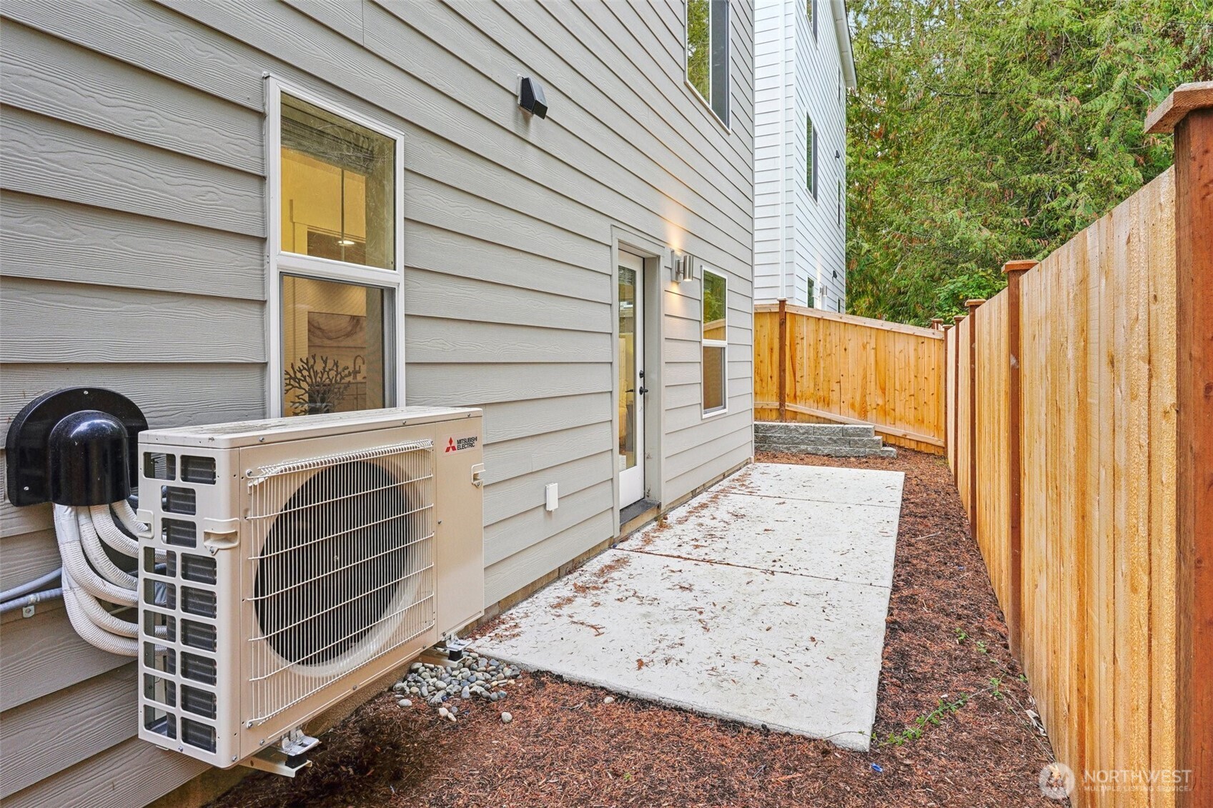 11 160th Place Southeast Bothell, WA 98012 - Photo 34 of 39 a view of a house with a door and wooden wall