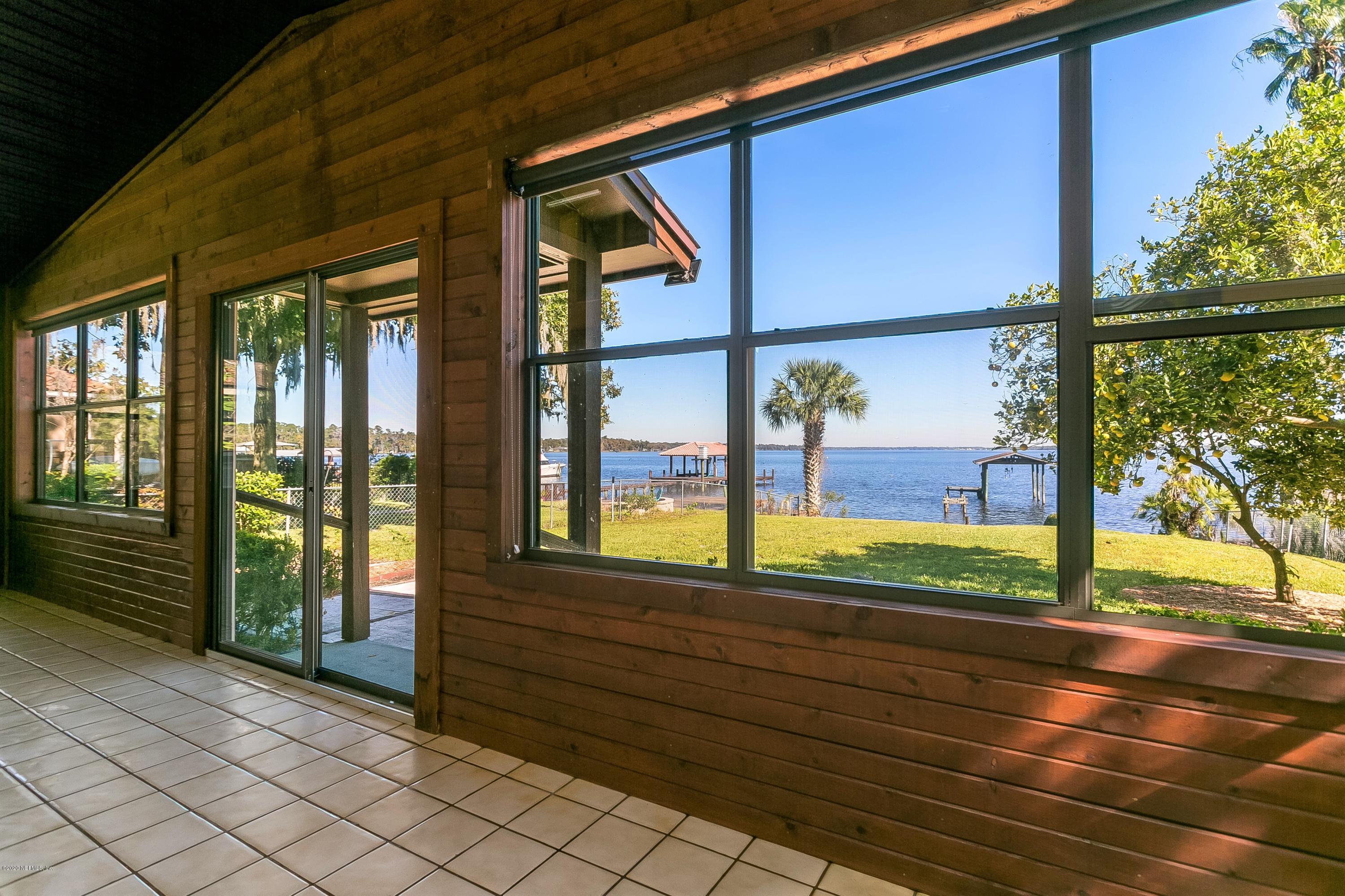 4239 Magnolia Road Orange Park, FL 32065 - Photo 17 of 40 a view of porch with a bench