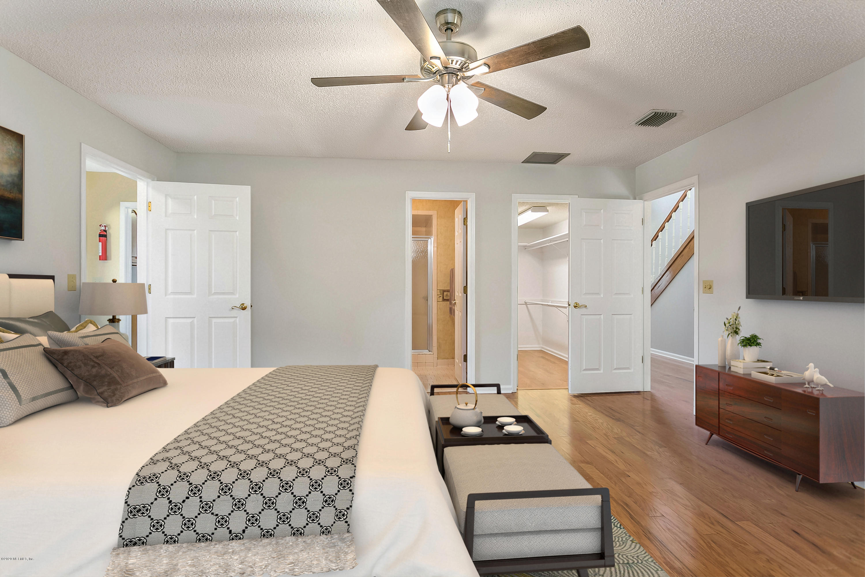 4239 Magnolia Road Orange Park, FL 32065 - Photo 20 of 40 a bedroom with furniture and a wooden floor