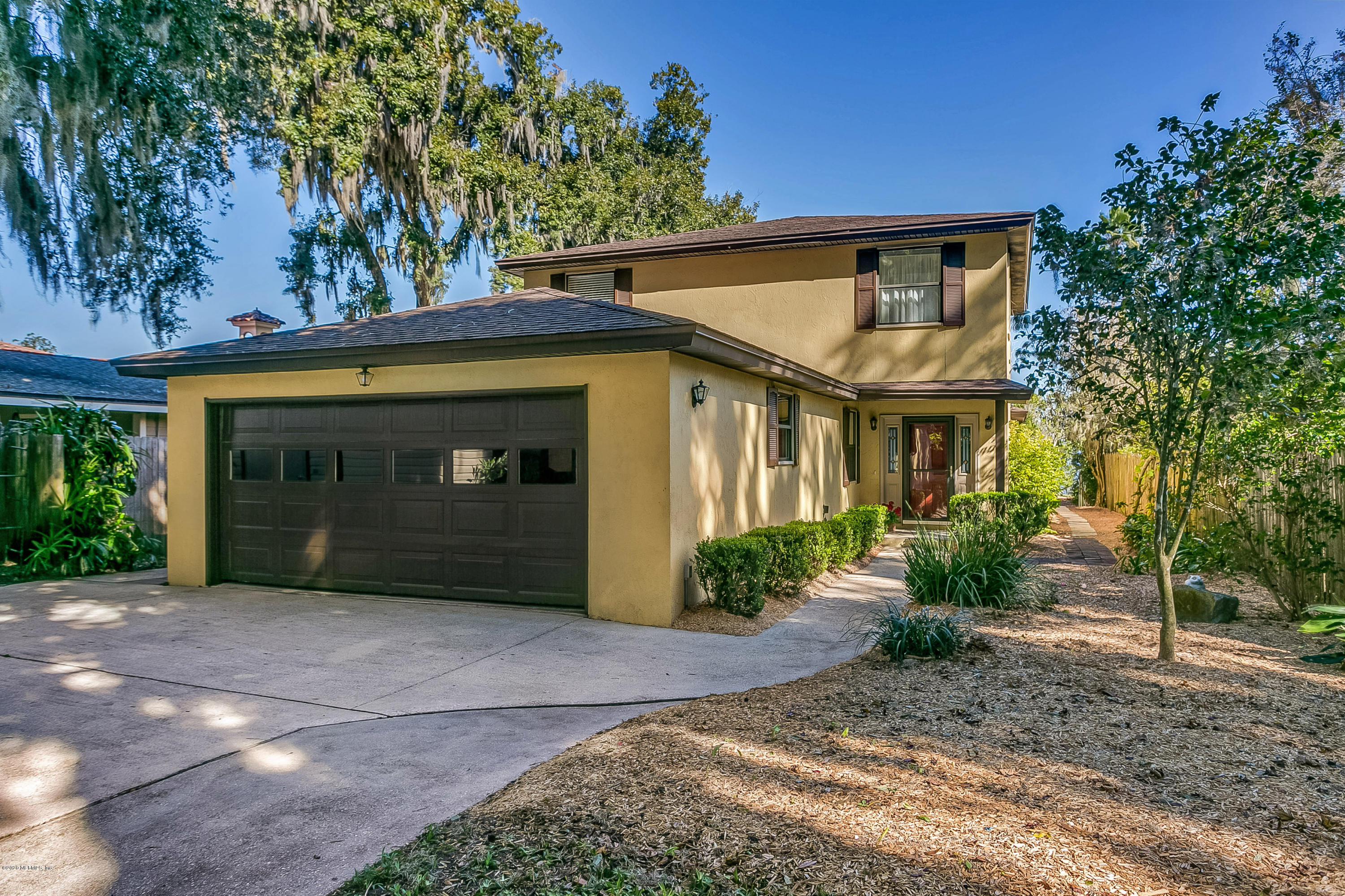 4239 Magnolia Road Orange Park, FL 32065 - Photo 2 of 40 a view of a house with a patio