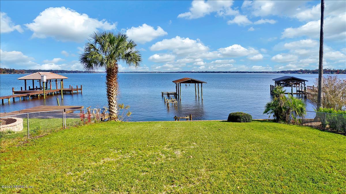 4239 Magnolia Road Orange Park, FL 32065 - Photo 33 of 40 a view of a house with a yard