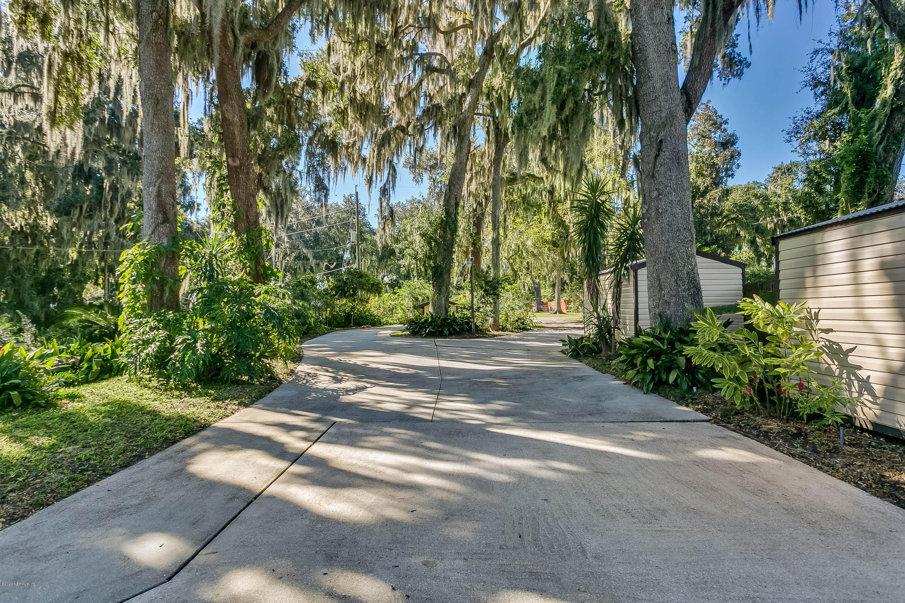 4239 Magnolia Road Orange Park, FL 32065 - Photo 35 of 40 a view of backyard with green space