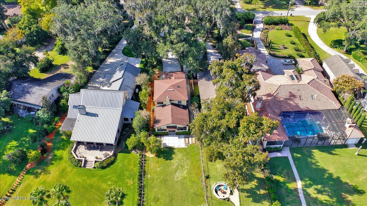 4239 Magnolia Road Orange Park, FL 32065 - Photo 39 of 40 an aerial view of residential house with outdoor space and swimming pool