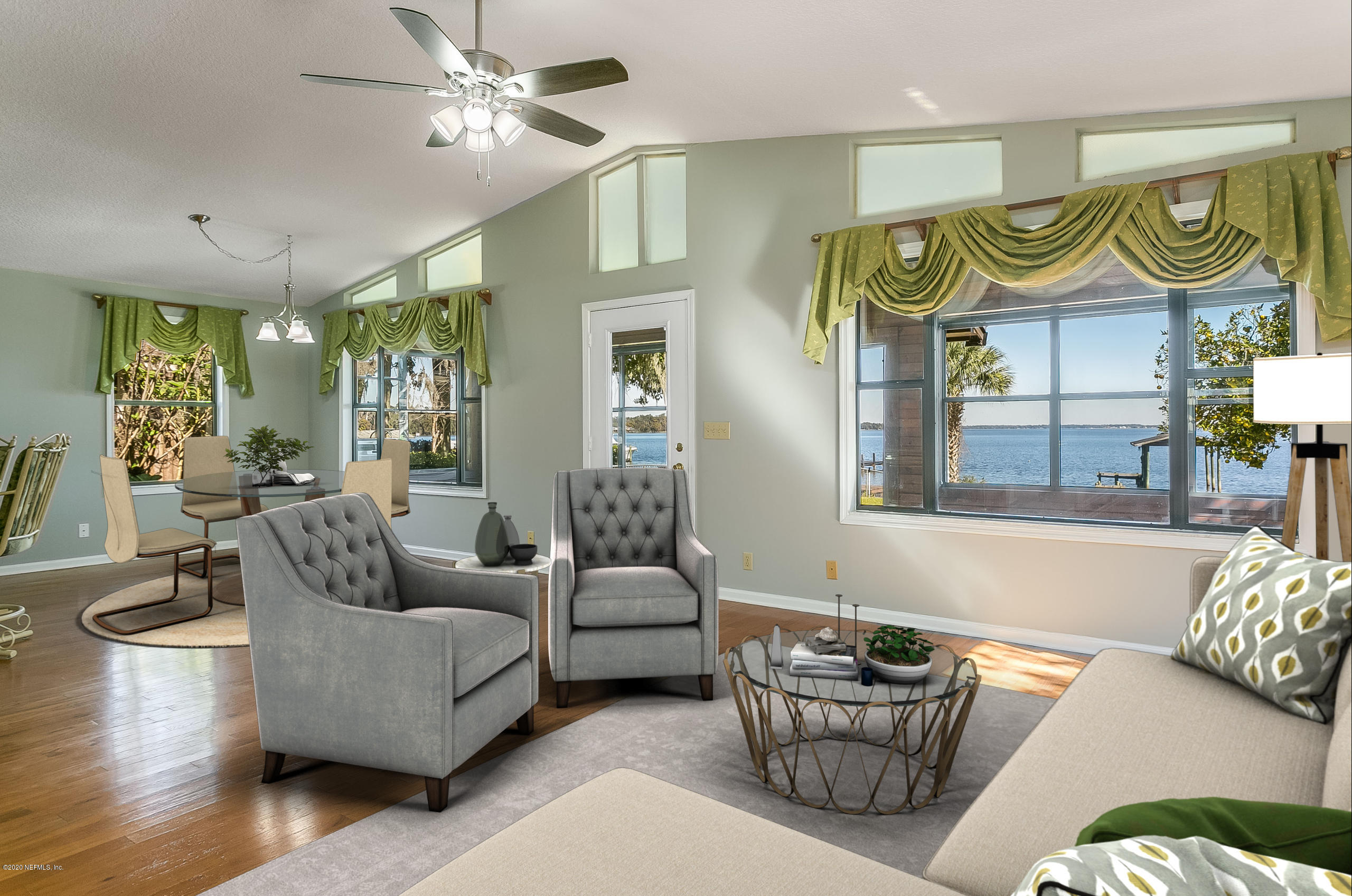 4239 Magnolia Road Orange Park, FL 32065 - Photo 6 of 40 a living room with furniture and a wooden floor