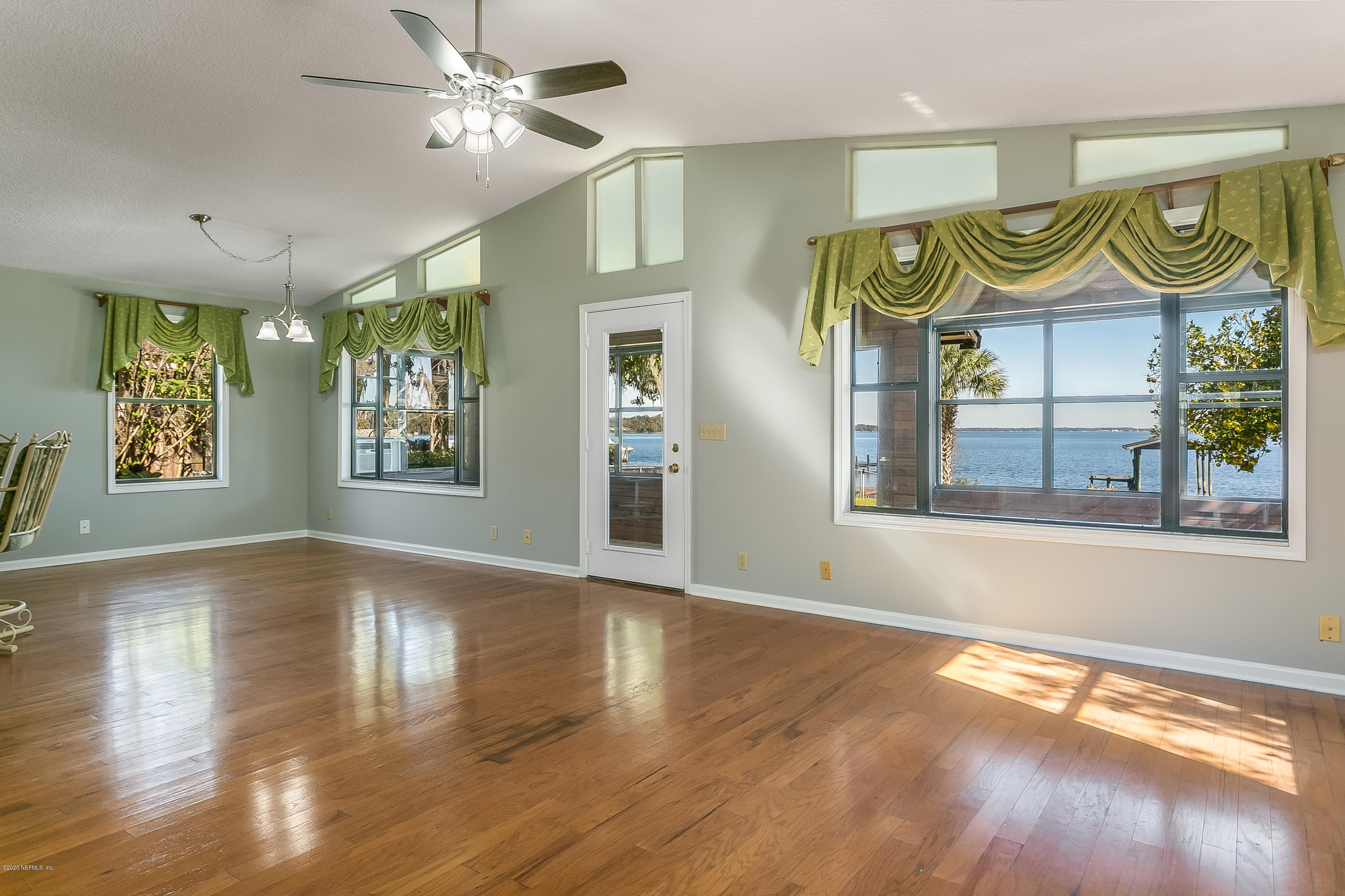 4239 Magnolia Road Orange Park, FL 32065 - Photo 7 of 40 a view of an entryway with wooden floor