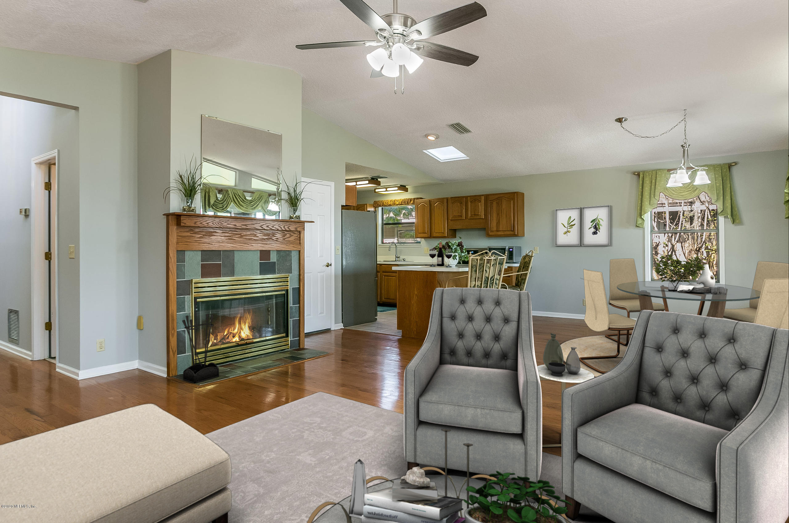 4239 Magnolia Road Orange Park, FL 32065 - Photo 10 of 40 a living room with furniture and a fireplace