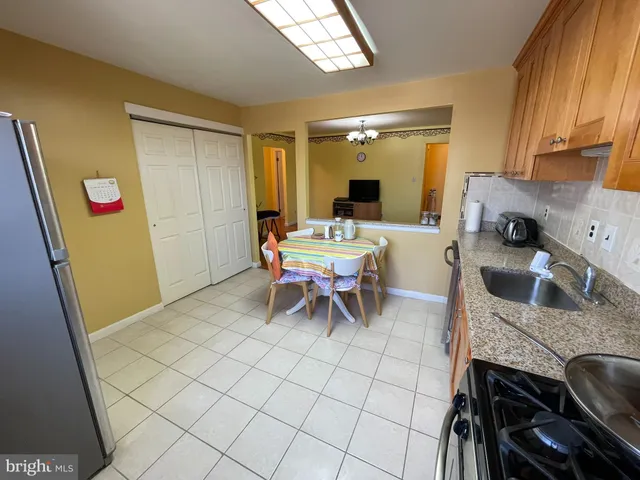 a dining room with furniture and a table