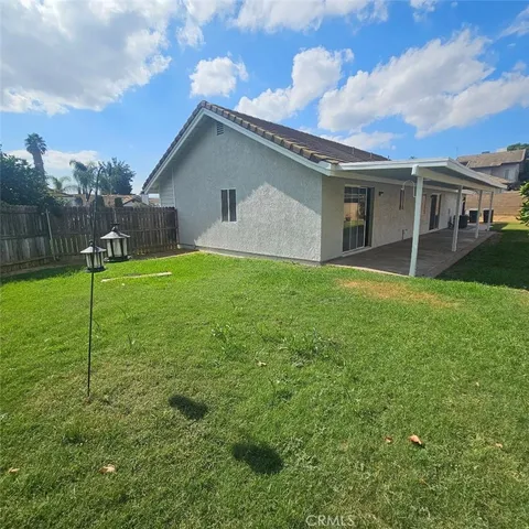 a house view with a garden space