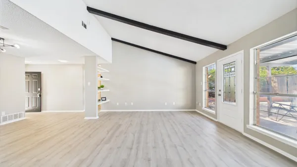 a kitchen with a sink and a window