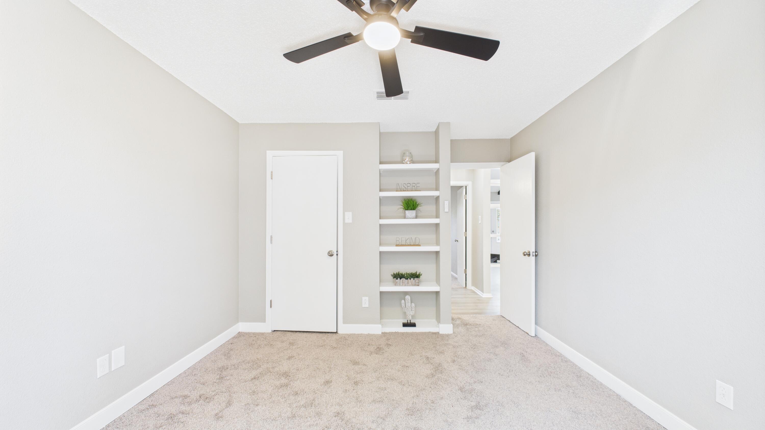 5719 2nd Street Lubbock, TX 79416 - Photo 36 of 61 a view of empty room with ceiling fan