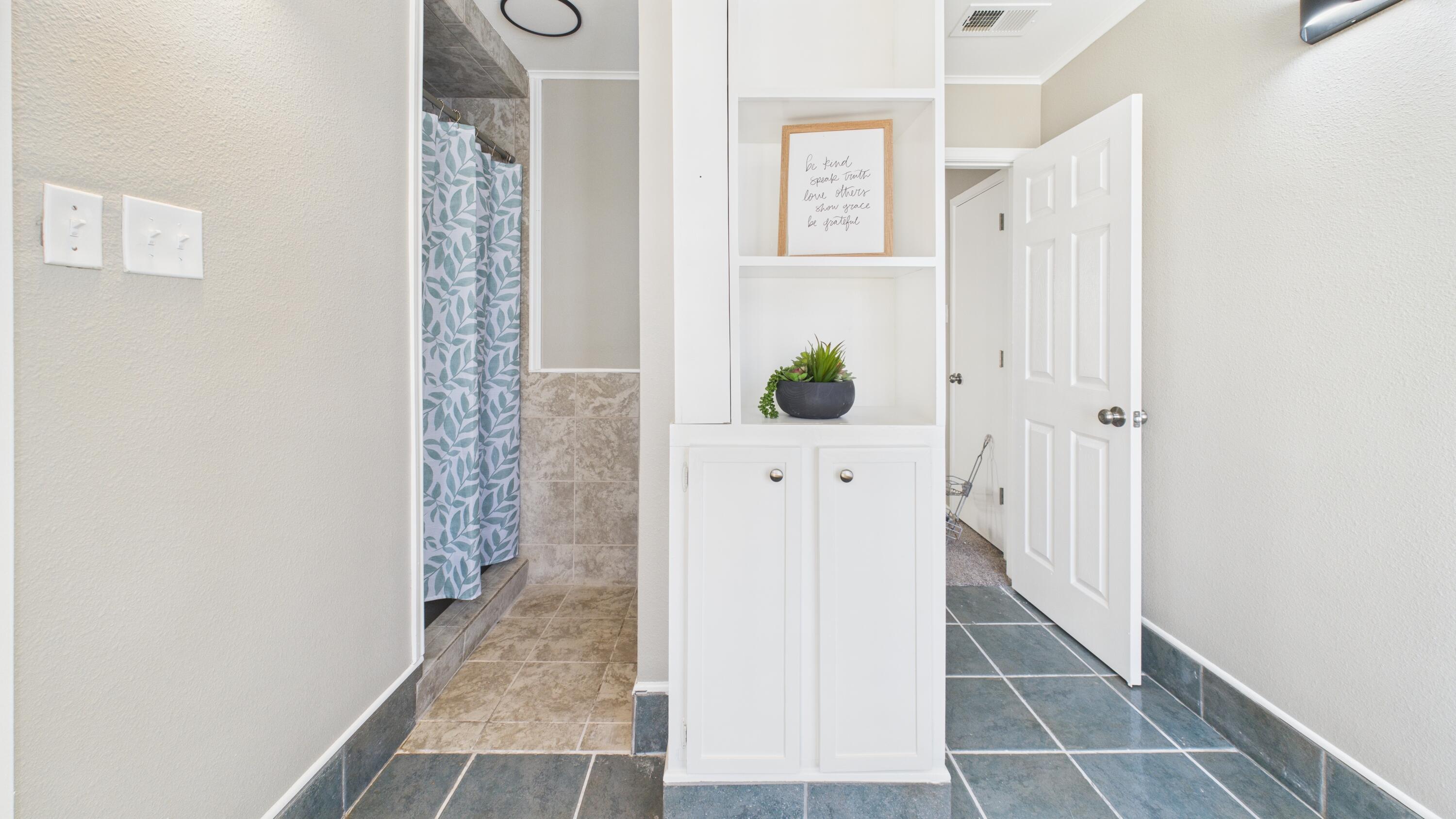 5719 2nd Street Lubbock, TX 79416 - Photo 48 of 61 a view of an entryway with wooden floor