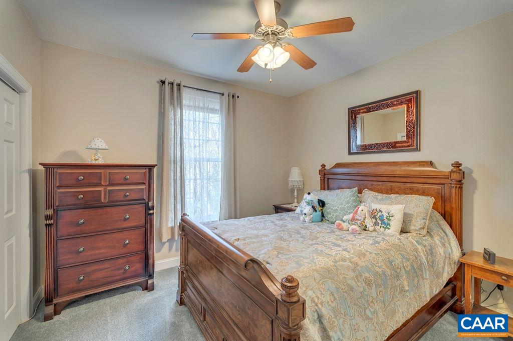 35 Oak Grove Road Palmyra, VA 22963 - Photo 18 of 42 a bedroom with a bed and a dresser