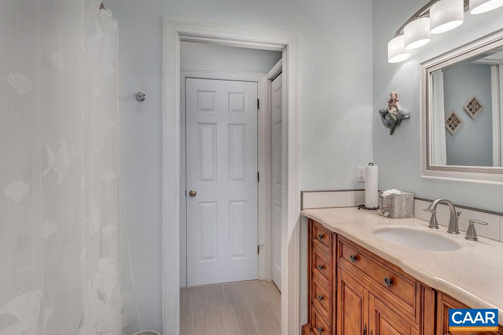35 Oak Grove Road Palmyra, VA 22963 - Photo 20 of 42 a bathroom with a sink and a mirror