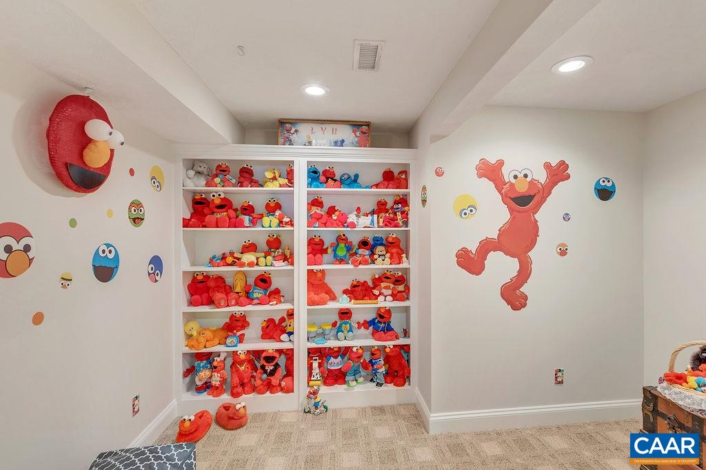 35 Oak Grove Road Palmyra, VA 22963 - Photo 34 of 42 a hallway with toys and painted walls