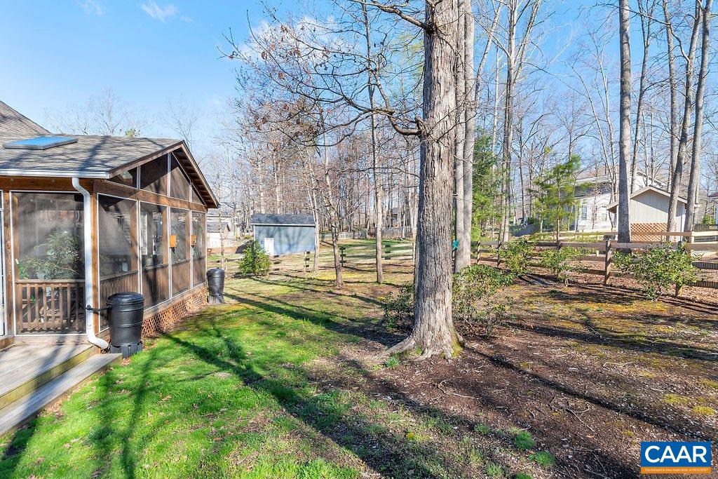 35 Oak Grove Road Palmyra, VA 22963 - Photo 40 of 42 a view of a house with a big yard and large tree