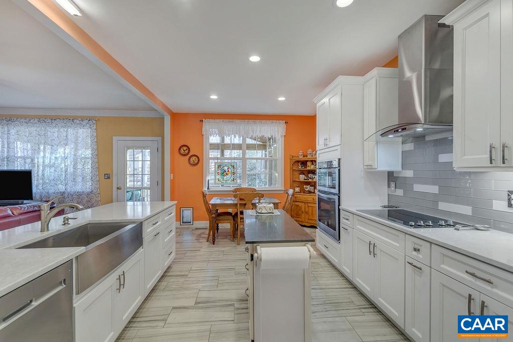 35 Oak Grove Road Palmyra, VA 22963 - Photo 10 of 42 a large kitchen with stainless steel appliances granite countertop a lot of counter space and a sink