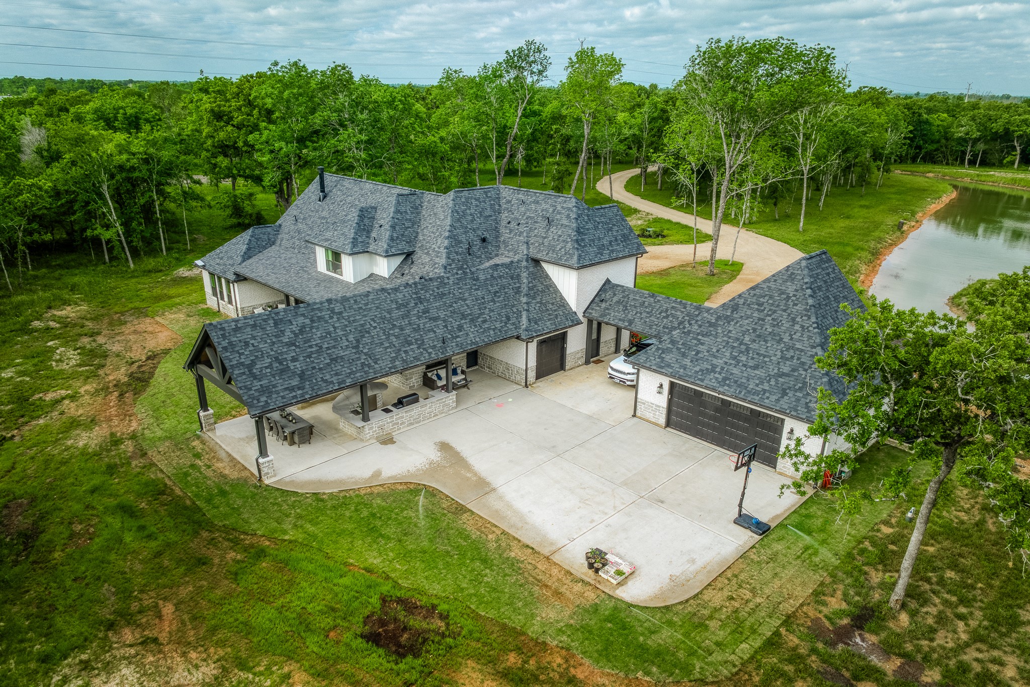 40051 Mesquite Hempstead, TX 77445 - Photo 5 of 29 an aerial view of a house with swimming pool garden and patio